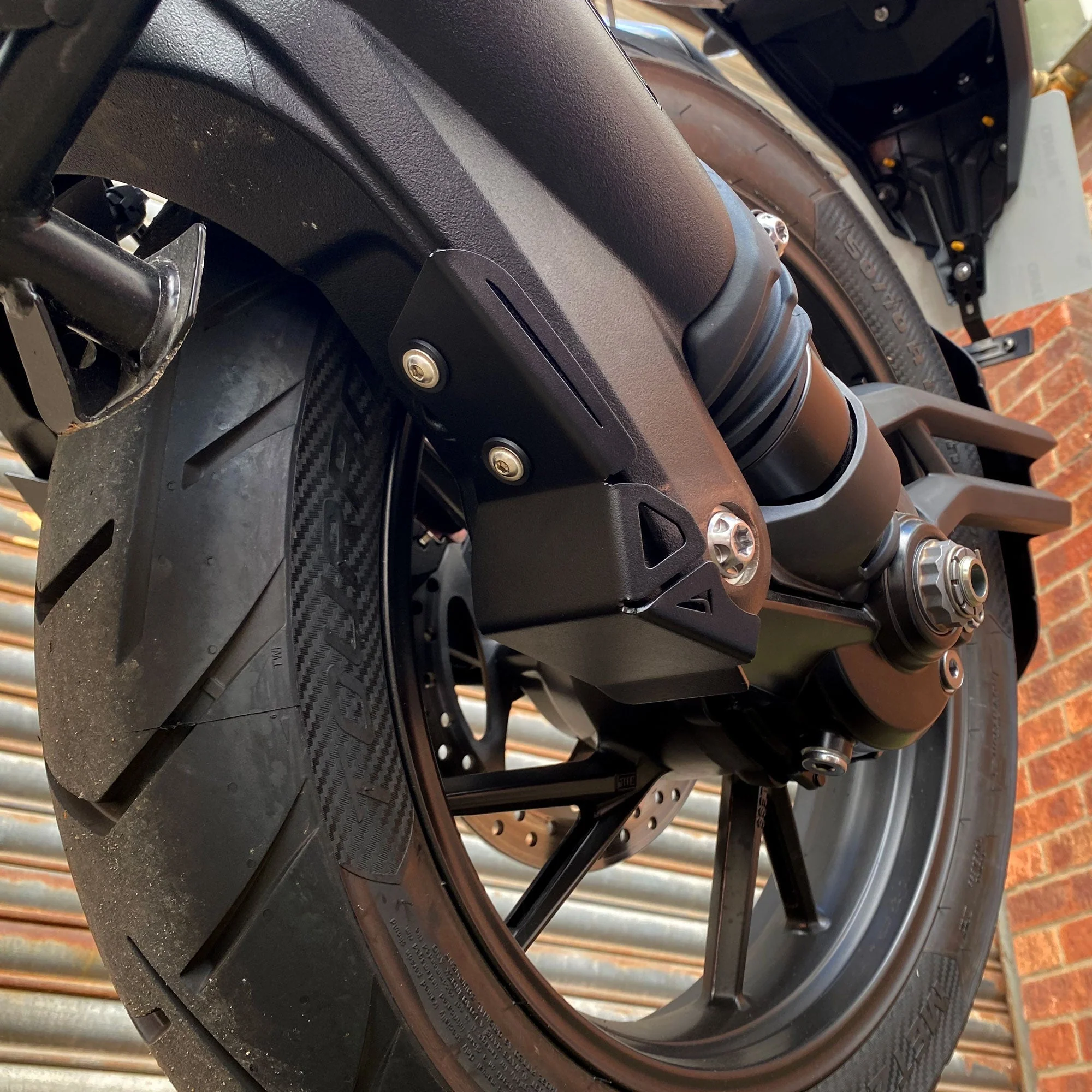 Pyramid Swingarm Protectors | Matte Black | Triumph Tiger 1200 GT Pro 2022>Current - Image 2